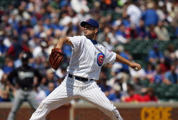 CHICAGO - MAY 2:  Ted Lilly #30 of the Chicago Cubs pitches against the Florida Marlins during the game on May 2, 2009 at Wrigley Field in Chicago, Illinois. (Photo by Jonathan Daniel/Getty Images) 