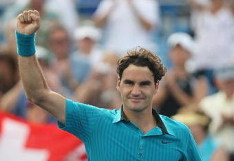 CINCINNATI - AUGUST 21:  Roger Federer of Switzerland waves to the crowd after defeating Lleyton Hewitt of Australia during day five of the Western & Southern Financial Group Masters on August 21, 2009 at the Lindner Family Tennis Center in Cincinnati, Ohio.  (Photo by Nick Laham/Getty Images)