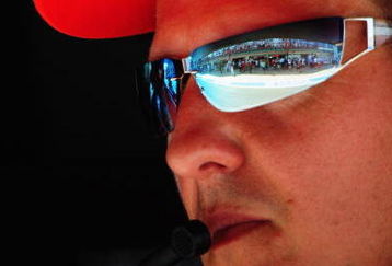 VALENCIA, SPAIN - AUGUST 21:  Former Ferrari F1 World Champion Michael Schumacher of Germany watches from the pitwall during practice for the European Formula One Grand Prix at the Valencia Street Circuit on August 21, 2009, in Valencia, Spain.  (Photo by Clive Mason/Getty Images)