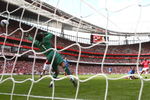 LONDON, ENGLAND - AUGUST 22:  Abou Diaby of Arsenal scores the opening goal during the Barclays Premier League match between Arsenal and Portsmouth at the Emirates Stadium on August 22, 2009 in London, England.  (Photo by Mike Hewitt/Getty Images)