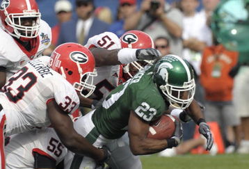 ORLANDO, FL - JANUARY 1: Running back Javon Ringer #23 of the Michigan State Spartans rushes upfield against the Georgia Bulldogs at the 2009 Capital One Bowl at the Citrus Bowl on January 1, 2009 in Orlando, Florida.  (Photo by Al Messerschmidt/Getty Images) 