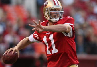 SAN FRANCISCO - AUGUST 14:  Quarterback Alex Smith #11 of the San Francisco 49ers passes against the Denver Broncos during the preseason game on August 14, 2009 at Candlestick Park in San Francisco, California. (Photo by Jed Jacobsohn/Getty Images)