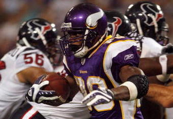 MINNEAPOLIS - NOVEMBER 02:  Adrian Peterson #28 of the Minnesota Vikings rushes against the Houston Texans during the second quarter at the Hubert H. Humphrey Metrodome on November 2, 2008 in Minneapolis, Minnesota.  (Photo by Harry How/Getty Images)