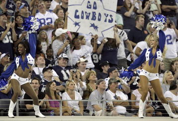 ARLINGTON, TX - AUGUST 21:  Dallas Cowboys Cheerleaders perform for the fans before the Cowboys take the field against the Tennessee Titans during a preseason game at Cowboys Stadium on August 21, 2009 in Arlington, Texas. (Photo by Tom Pennington/Getty Images)