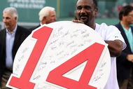 BOSTON - JULY 28:  Former Boston Red Sox outfielder Jim Rice shows off his retired number plaque during a ceremony before the Boston Red Sox game against the Oakland Athletics at Fenway Park July 28, 2009 in Boston, Massachusetts.  (Photo by Elsa/Getty Images)