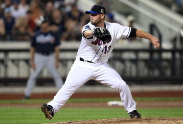 NEW YORK - AUGUST 20:  Billy Wagner #13 of the New York Mets delivers a pitch against the Atlanta Braves on August 20, 2009 at Citi Field in the Flushing neighborhood of the Queens borough of New York City.  (Photo by Jim McIsaac/Getty Images)