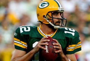 GREEN BAY, WI - AUGUST 15:  Quarterback Aaron Rodgers #12 of the Green Bay Packers looks to pass against the Cleveland Browns during the preseason game at Lambeau Field on August 15, 2009 in Green Bay, Wisconsin.  (Photo by Jonathan Daniel/Getty Images)