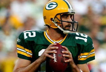 GREEN BAY, WI - AUGUST 15:  Quarterback Aaron Rodgers #12 of the Green Bay Packers looks to pass against the Cleveland Browns during the preseason game at Lambeau Field on August 15, 2009 in Green Bay, Wisconsin.  (Photo by Jonathan Daniel/Getty Images)