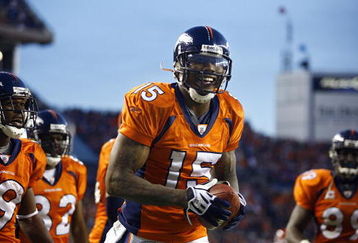 DENVER - DECEMBER 7: Wide reiver Brandon Marshall #15 of the Denver Broncos was all smiles after catching the game winning touchdown against the Kansas City Chiefs during the fourth quarter of week 14 NFL action at Invesco Field at Mile High on December 7, 2008 in Denver, Colorado. Denver beat Kansas City 24-17.(Photo by Marc Piscotty/Getty Images)