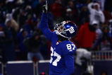 EAST RUTHERFORD, NJ - DECEMBER 21:  Wide receiver Domenik Hixon #87 of the New York Giants of celebrates in the endzone after scoring a touchdown against the Carolina Panthers on December 21, 2008 at Giants Stadium in East Rutherford, New Jersey.  (Photo by Chris McGrath/Getty Images)