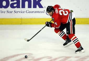 CHICAGO - APRIL 18:  Martin Havlat #24 of the Chicago Blackhawks skates with the puck against the Calgary Flames during Game Two of the Western Conference Quarterfinals of the 2009 Stanley Cup Playoffs on April 18, 2009 at the United Center in Chicago, Illinois.  (Photo by Jonathan Daniel/Getty Images)