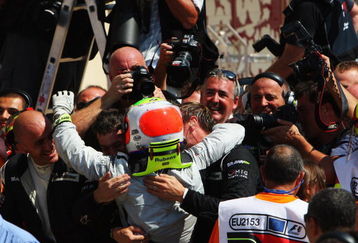 VALENCIA, SPAIN - AUGUST 23:  Rubens Barrichello of Brazil and Brawn GP celebrates in parc ferme after winning the European Formula One Grand Prix at the Valencia Street Circuit on August 23, 2009, in Valencia, Spain.  (Photo by Mark Thompson/Getty Images)