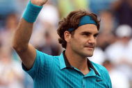 Roger Federer of Switzerland waves to the crowd after defeating Andy Murray of Great Britain during day six of the Western & Southern Financial Group Masters on August 22, 2009 at the Lindner Family Tennis Center in Cincinnati, Ohio.  (Photo by Nick Laham/Getty Images)