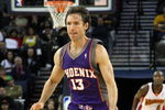 OAKLAND, CA - MARCH 15:  Steve Nash #13 of the Phoenix Suns dribbles the ball against the Golden State Warriors during an NBA game on March 15, 2009 at Oracle Arena in Oakland, California. NOTE TO USER: User expressly acknowledges and agrees that, by downloading and or using this photograph, User is consenting to the terms and conditions of the Getty Images License Agreement.  (Photo by Jed Jacobsohn/Getty Images)