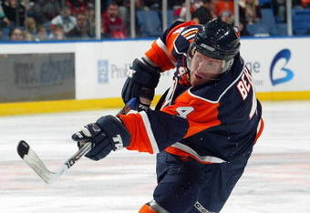 UNIONDALE, NY - DECEMBER 3: Bryan Berard #4 of the New York Islanders passes the puck against the Boston Bruins on December 3, 2007 at the Nassau Coliseum in Uniondale, New York. The Bruins defeated the Islanders 3-1. (Photo by Bruce Bennett/Getty Images) 