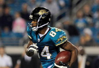 JACKSONVILLE, FL - DECEMBER 18:  Troy Williamson #84 of the Jacksonville Jaguars returns a punt during the game against the Indianapolis Colts at Jacksonville Municipal Stadium on December 18, 2008 in Jacksonville, Florida.  (Photo by Sam Greenwood/Getty Images)