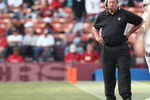 SAN FRANCISCO - AUGUST 22:  Head coach Tom Cable of the Oakland Raiders looks on against the San Francisco 49ers during a preseason game on August 22, 2009 at Candlestick Park in San Francisco, California.  (Photo by Jed Jacobsohn/Getty Images)