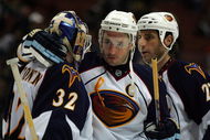 ANAHEIM, CA - FEBRUARY 15: Captain Ilya Kovalchuk #17 of the Atlanta Thrashers congratulates goaltender Kari Lehtonen #32 as teammate Chris Thorburn #27 looks on after they defeated the Anaheim Ducks 8-4 in their NHL game at Honda Center on February 15, 2009 in Anaheim, California. (Photo by Victor Decolongon/Getty Images)