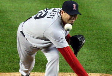 NEW YORK - MAY 05:  Josh Beckett #19 of the Boston Red Sox delivers a pitch against the New York Yankees on May 5, 2009 at Yankee Stadium in the Bronx borough of New York City. The Red Sox defeated the Yankees 7-3.  (Photo by Jim McIsaac/Getty Images)
