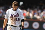 NEW YORK - AUGUST 23:  Jeff Francoeur #12 of the New York Mets reacts after hitting into an unassisted triple play by Eric Bruntlett #4 of the Philadelphia Phillies to end  their game on August 23, 2009 at Citi Field in the Flushing neighborhood of the Queens borough of New York City.  (Photo by Al Bello/Getty Images)