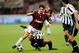 MILAN, ITALY - AUGUST 17: Pato of Milan is taken down during the Luigi Berlusconi Trophy match between Milan AC and Juventus FC at Giuseppe Meazza Stadium on August 17, 2009 in Milan, Italy. (Photo by Claudio Villa/Getty Images)