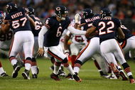 CHICAGO - AUGUST 22: Quarterback Jay Cutler #6 of the Chicago Bears hands the ball off to Matt Forte #22 against the New York Giants during their preseason NFL game at Soldier Field on August 22, 2009 in Chicago, Illinois.  (Photo by Jonathan Daniel/Getty Images)