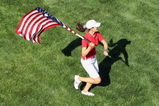 SUGAR GROVE, IL - AUGUST 23:  Michelle Wie of the U.S. Team celebrates on the 18th fairway after the match was won in the Sunday singles matches at the 2009 Solheim Cup Matches at the Rich Harvest Farms Golf Club on August 23, 2009 in Sugar Grove, Ilinois (Photo by David Cannon/Getty Images)