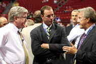 MONTREAL, QC - JUNE 26:  President & General Manager Brian Burke (L) and head coach Ron Wilson (R) of the Toronto Maple Leafs talk with Genral Manager Joe Nieuwendyk of the Dallas Stars prior to the first round of the 2009 NHL Entry Draft at the Bell Centre on June 26, 2009 in Montreal, Quebec, Canada.  (Photo by Bruce Bennett/Getty Images)