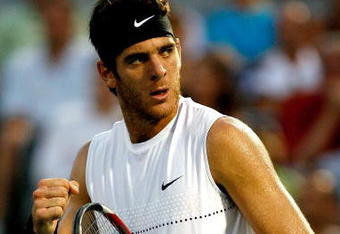 MONTREAL, QC - AUGUST 15:  Juan Martin Del Potro of Argentina celebrates breaking Andy Roddick of the United States in the second set during the semifinals of the Rogers Cup at Uniprix Stadium on August 15, 2009 in Montreal, Canada.  (Photo by Matthew Stockman/Getty Images)