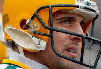 GREEN BAY - DECEMBER 7:  Quarterback Aaron Rodges #12 of the Green Bay Packers looks to the boards during the game against the Houston Texans at Lambeau Field on December 7, 2008 in Green Bay, Wisconsin.  ( Photo by: Jeff Gross/Getty Images)