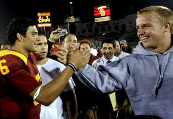 LOS ANGELES, CA - SEPTEMBER 13:  Mark Sanchez #6 of the USC Trojans shakes hands with Matt Barkley, who committed to USC, after defeating the Ohio State Buckeyes 35-3 after the college football game at the Los Angeles Memorial Coliseum on September 13, 2008 in Los Angeles, California.  (Photo by Stephen Dunn/Getty Images)