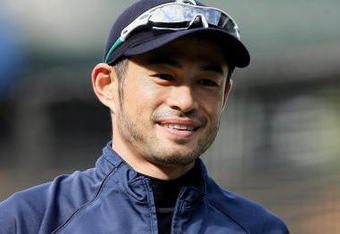 SEATTLE - AUGUST 14:  Ichiro Suzuki #51 of the Seattle Mariners warms up prior to the game against the New York Yankees at Safeco Field on August 14, 2009 in Seattle, Washington.  The Yankees won 4-2.  (Photo by Otto Greule Jr/Getty Images)
