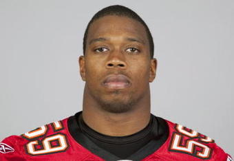 TAMPA, FL - 2009:  Angelo Crowell of the Tampa Bay Buccaneers poses for his 2009 NFL headshot at photo day in Tampa, Florida.  (Photo by NFL Photos)     