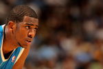 DENVER - APRIL 29:  Chris Paul #3 of the New Orleans Hornets awaits action against the Denver Nuggets in Game Five of the Western Conference Quarterfinals during the 2009 NBA Playoffs at Pepsi Center on April 29, 2009 in Denver, Colorado. The Nuggets defeated the Hornets 107-86 to advance to the Western Conference Semifinals against Dallas. NOTE TO USER: User expressly acknowledges and agrees that, by downloading and or using this photograph, User is consenting to the terms and conditions of the Getty Images License Agreement.  (Photo by Doug Pensinger/Getty Images)