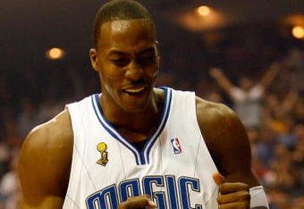 ORLANDO, FL - JUNE 11: Dwight Howard #12 of the Orlando Magic reacts in the first quarter of Game Four of the 2009 NBA Finals against the Los Angeles Lakers on June 11, 2009 at Amway Arena in Orlando, Florida.  NOTE TO USER:  User expressly acknowledges and agrees that, by downloading and or using this photograph, User is consenting to the terms and conditions of the Getty Images License Agreement.  (Photo by Chris Graythen/Getty Images)