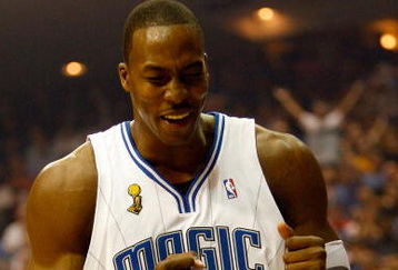 ORLANDO, FL - JUNE 11: Dwight Howard #12 of the Orlando Magic reacts in the first quarter of Game Four of the 2009 NBA Finals against the Los Angeles Lakers on June 11, 2009 at Amway Arena in Orlando, Florida.  NOTE TO USER:  User expressly acknowledges and agrees that, by downloading and or using this photograph, User is consenting to the terms and conditions of the Getty Images License Agreement.  (Photo by Chris Graythen/Getty Images)