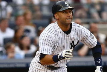 NEW YORK - AUGUST 08:  Derek Jeter #2 of the New York Yankees runs to first base against the Boston Red Sox during their game on August 8, 2009 at Yankee Stadium in the Bronx borough of New York City.  (Photo by Chris McGrath/Getty Images)