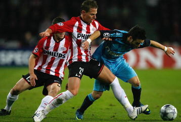 EINDHOVEN, NETHERLANDS - OCTOBER 22:  Balazs Dsudzsak of PSV Eindhoven battles for the ball with Mathieu Valbuena of Marseille during the UEFA Champions League Group D match between PSV Eindhoven and Marseille at the Philips Stadium on October 22, 2008 in Eindhoven, Netherlands.  (Photo by Paul Gilham/Getty Images)