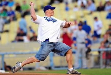 LOS ANGELES, CA - AUGUST 20: WWE Superstar John Cena throws the ceremonial first pitch for the Los Angeles Dodgers as they play the Chicago Cubs on August 20, 2009 at Dodger Stadium in Los Angeles, California. (Photo by Jacob de Golish/Getty Images)