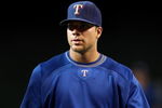 PHOENIX - JUNE 23:  Chris Davis #19 of the Texas Rangers warms up before the major league baseball game against the Arizona Diamondbacks at Chase Field on June 23, 2009 in Phoenix, Arizona. The Diamondbacks defeated the Rangers 8-2.  (Photo by Christian Petersen/Getty Images)