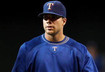 PHOENIX - JUNE 23:  Chris Davis #19 of the Texas Rangers warms up before the major league baseball game against the Arizona Diamondbacks at Chase Field on June 23, 2009 in Phoenix, Arizona. The Diamondbacks defeated the Rangers 8-2.  (Photo by Christian Petersen/Getty Images)