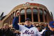NEW YORK - APRIL 13:  Fans stand outside before the start of the Opening Day game between the San Diego Padres and the New York Mets at Citi Field on April 13, 2009 in the Flushing neighborhood of the Queens borough of New York City. This is the first regular season MLB game being played at the new venue which replaced Shea stadium as the Mets home field.  (Photo by Spencer Platt/Getty Images)
