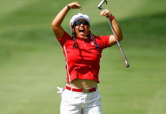 SUGAR GROVE, IL - AUGUST 23:  Christina Kim of the U.S. Team celebrates winning the 14th hole during the Sunday singles matches at the 2009 Solheim Cup at Rich Harvest Farms on August 23, 2009 in Sugar Grove, Illinois.  (Photo by Scott Halleran/Getty Images)