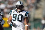 OAKLAND - NOVEMBER 9:  Julius Peppers #90 of the Carolina Panthers walks on the field during the game against the Oakland Raiders at the Oakland-Alameda County Coliseum on November 9, 2008 in Oakland, California. (Photo by: Jed Jacobsohn/Getty Images)