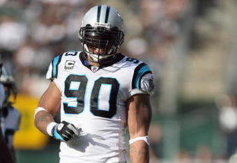 OAKLAND - NOVEMBER 9:  Julius Peppers #90 of the Carolina Panthers walks on the field during the game against the Oakland Raiders at the Oakland-Alameda County Coliseum on November 9, 2008 in Oakland, California. (Photo by: Jed Jacobsohn/Getty Images)