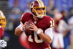 BALTIMORE, MD - AUGUST 13:  Chase Daniel #10 of the Washington Redskins looks to throw a pass during  warm ups of aa NFL preseason football game against the Baltimore Ravens on August 13, 2009 at M & T Bank Stadium in Baltimore, Maryland.   (Photo by Mitchell Layton/Getty Images)