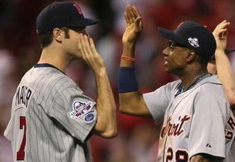 ST. LOUIS, MO - JULY 14:  American League All-Star Curtis Granderson #28 of the Detroit Tigers high fives Joe Mauer of the Minnesota Twins following the 2009 MLB All-Star Game at Busch Stadium on July 14, 2009 in St Louis, Missouri. (Photo by Dilip Vishwanat/Getty Images)