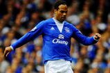 LIVERPOOL, ENGLAND - AUGUST 15:   Joleon Lescott of Everton runs with the ball during the Barclays Premier League match between Everton and Arsenal at Goodison Park on August 15, 2009 in Liverpool, England. (Photo by Michael Regan/Getty Images)