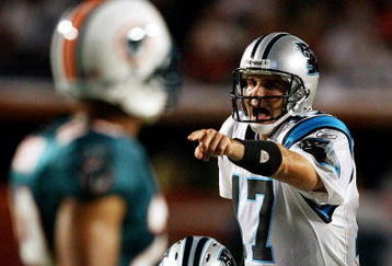 MIAMI - AUGUST 22:  Quarterback Jake Delhomme #17 of the Carolina Panthers calls out assignments from the line of scrimmage while taking on the Miami Dolphins during a pre-season game at Land Shark Stadium on August 22, 2009 in Miami, Florida.  (Photo by Doug Benc/Getty Images)