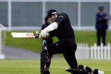 NEW ZEALAND - DECEMBER 04:  Black Max Chris Cairns hits out to the boundary to be caught out by India's Sehwag for 7 during the first innings of their Max cricket international at Jade Stadium,Wednesday.  (Photo by Simon Baker/Getty Images)